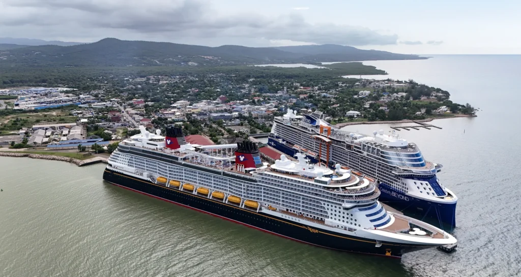 Cruise ships alongside a waterfront town