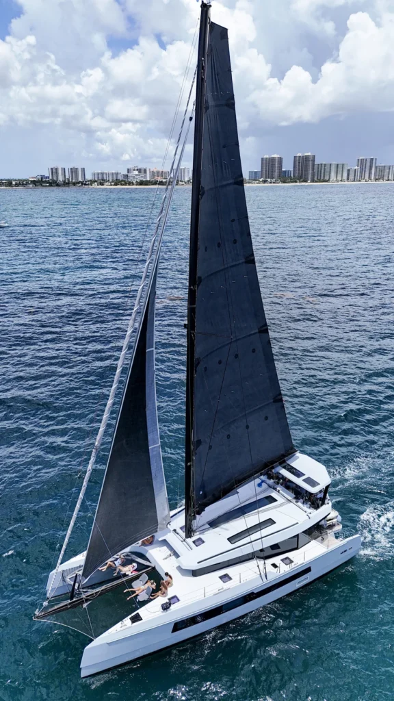 Sailing catamaran on open water