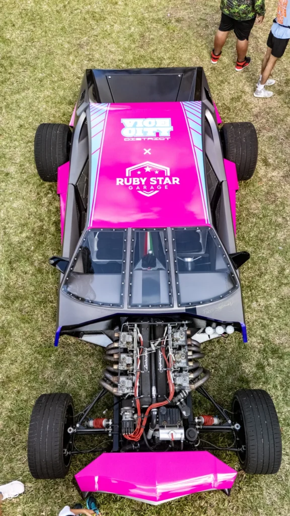 Overhead view of a pink display vehicle
