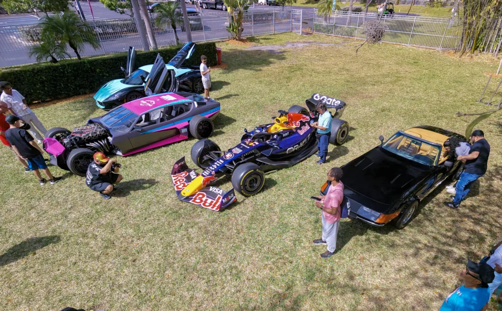 Vehicles and visitors in an outdoor display area