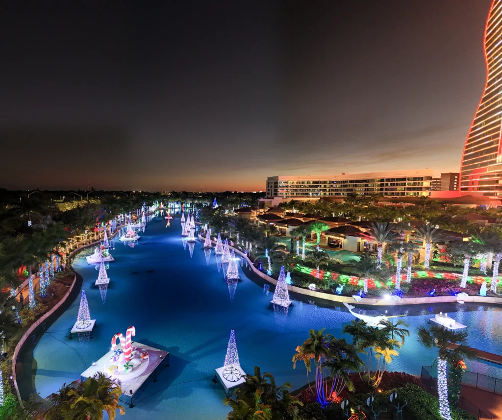 Illuminated waterfront venue at night