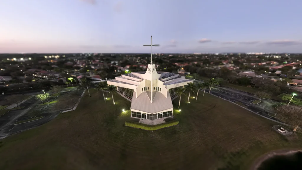 Venue building and surrounding grounds at dusk