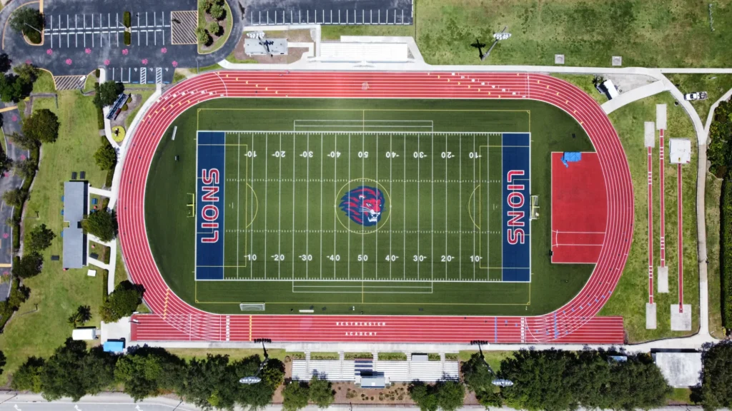 Overhead view of a stadium field and track