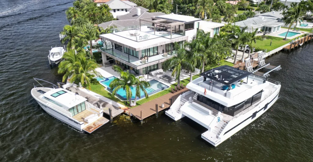 Modern waterfront property and docked boats