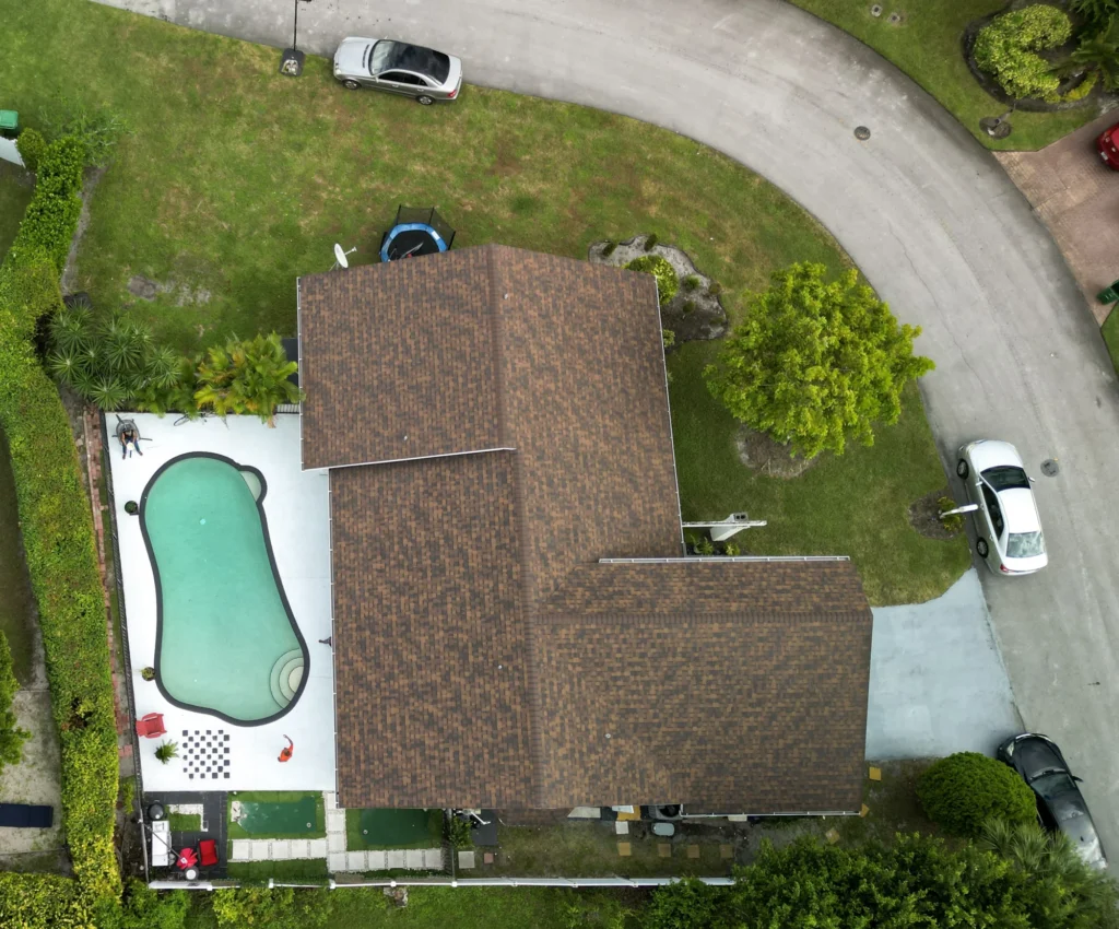 Overhead property view with a pool