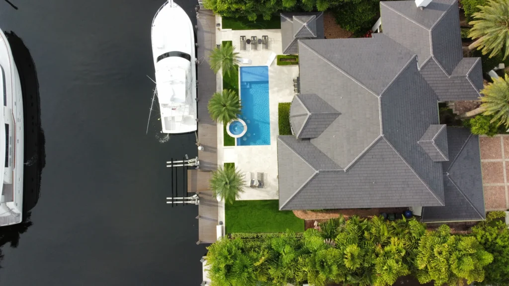 Overhead view of a waterfront roof and pool
