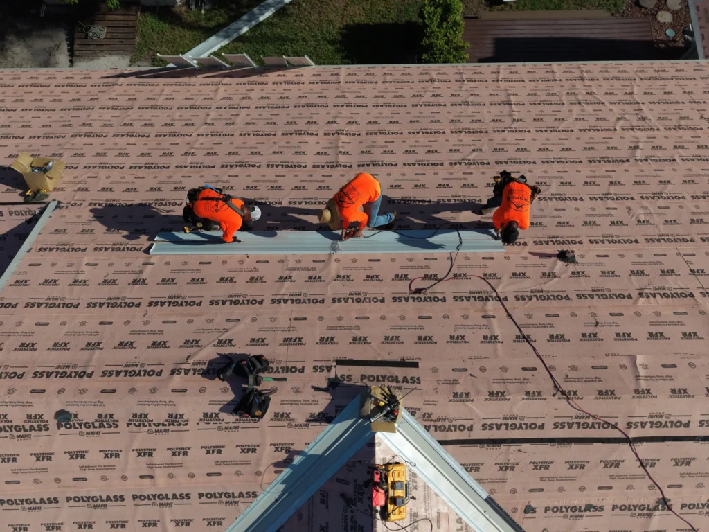 Overhead view of roof installation activity