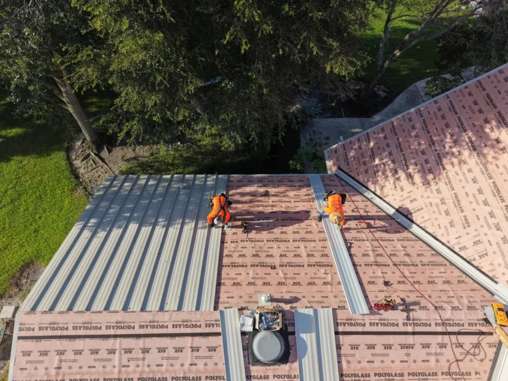 Roof panels, underlayment and active work area